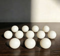 Drop 10 ping pong balls and get 2 free ping pong balls.